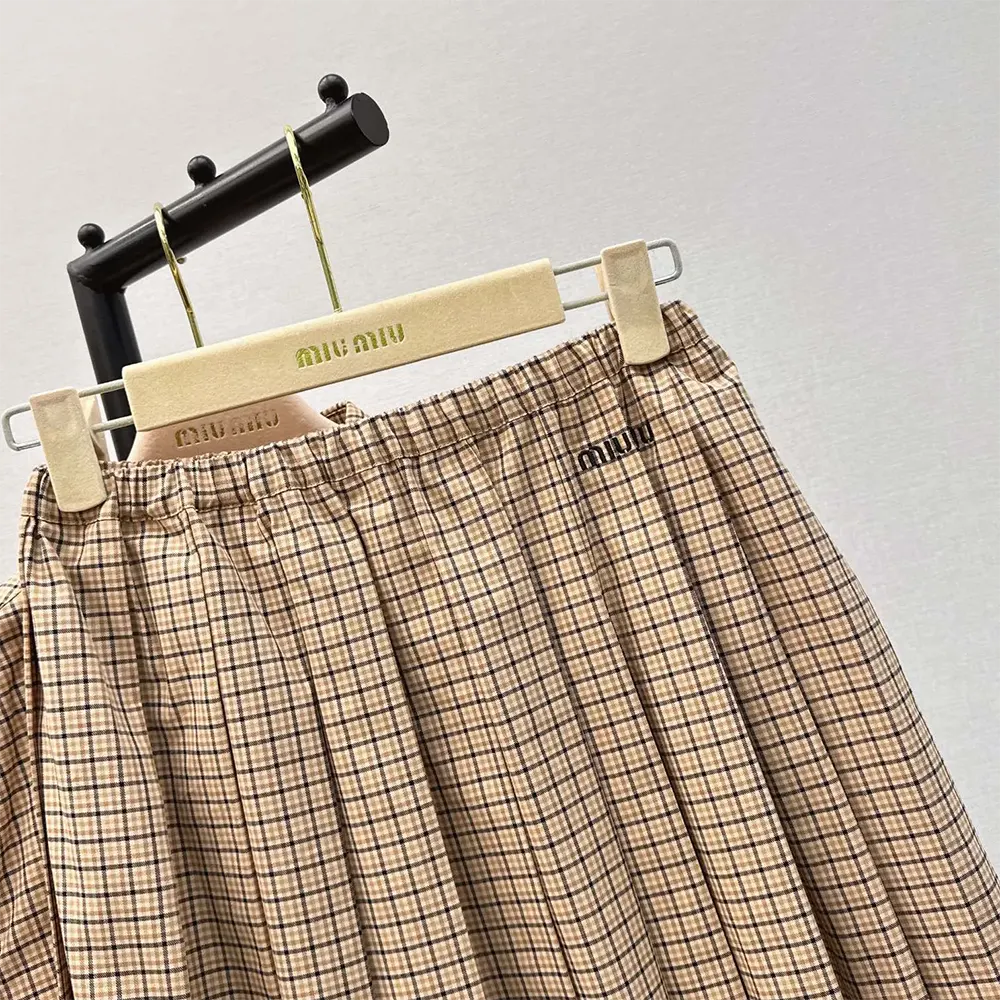Side angle showing silhouette of Miu Miu Women Checked Miniskirt with Embroidered Logo