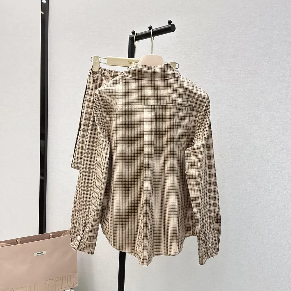Side angle showing button closure and fit of Miu Miu Women Checked Shirt