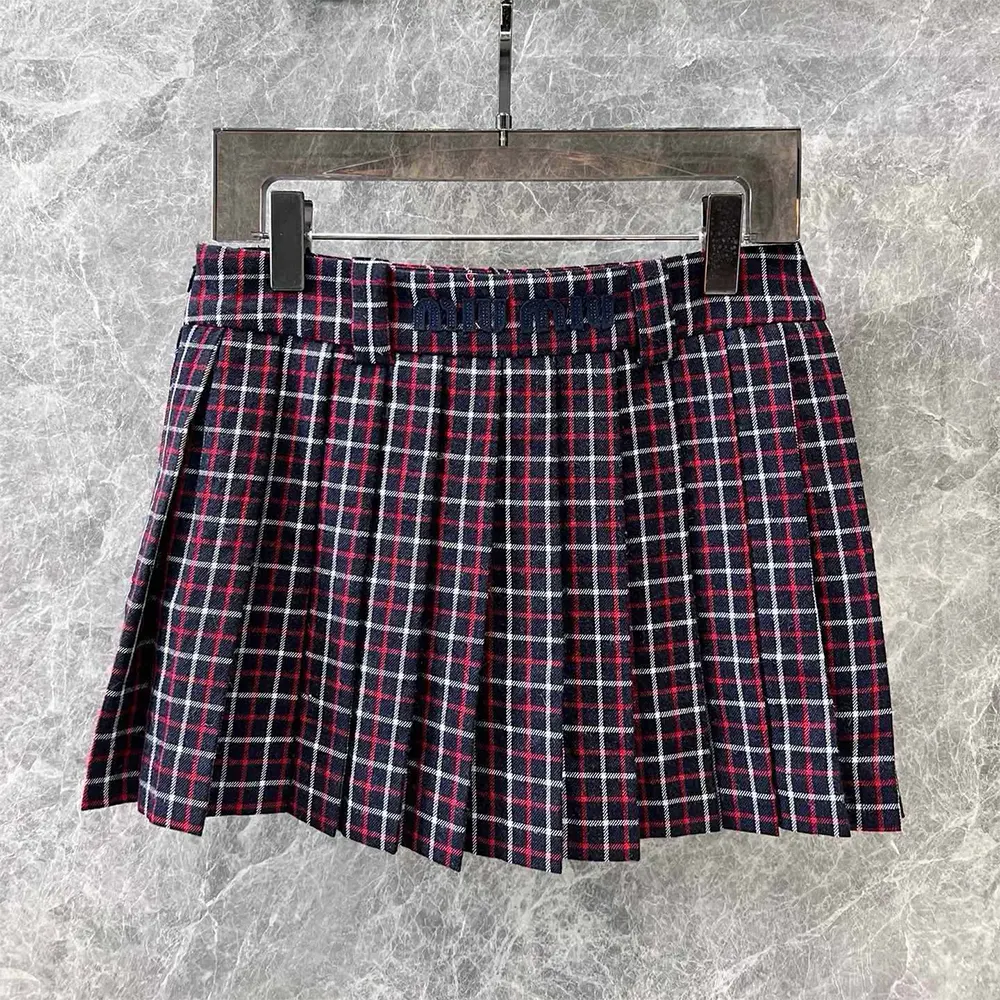 Side angle showing silhouette of Miu Miu Women Checked Wool Miniskirt