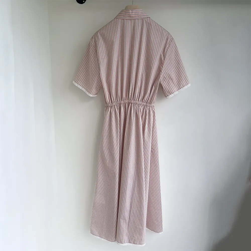Side angle showcasing silhouette of Miu Miu Women Cotton Dress