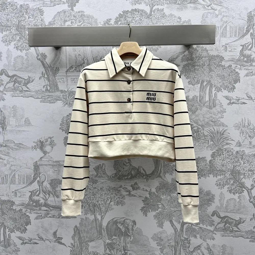 Side angle showing relaxed fit of Miu Miu Women Cotton Fleece Polo Shirt
