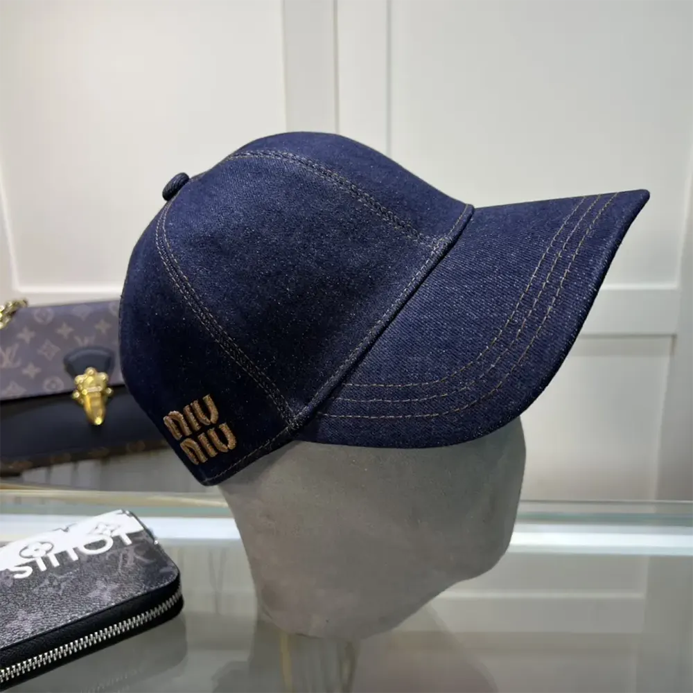 Close-up of adjustable strap and Miu Miu logo hardware detail