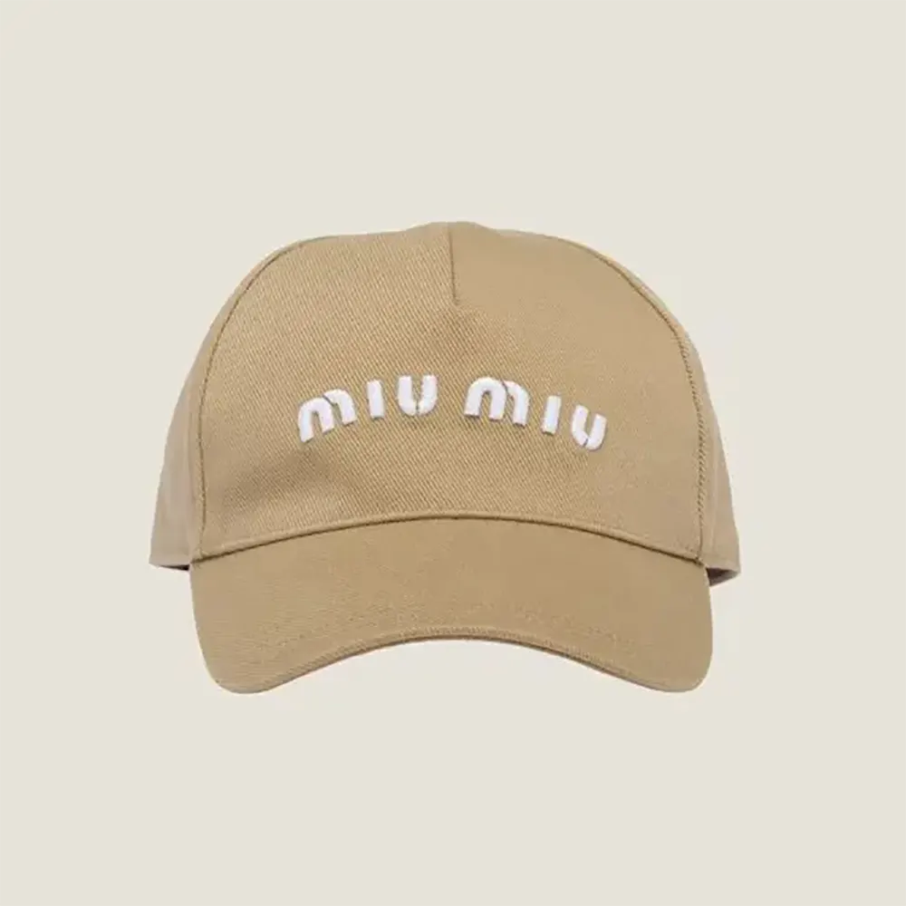 Front view of Miu Miu Women Drill Baseball Cap-Beige showing logo