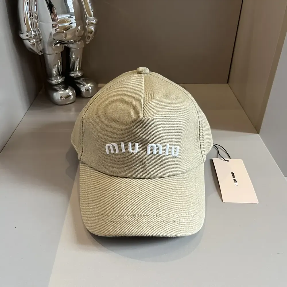 Side angle detail of adjustable strap on Miu Miu Women Drill Baseball Cap-Beige