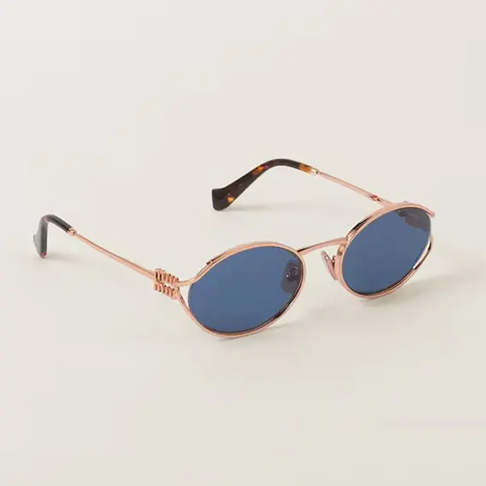 Front view of Miu Miu Women Logo Sunglasses in blue acetate