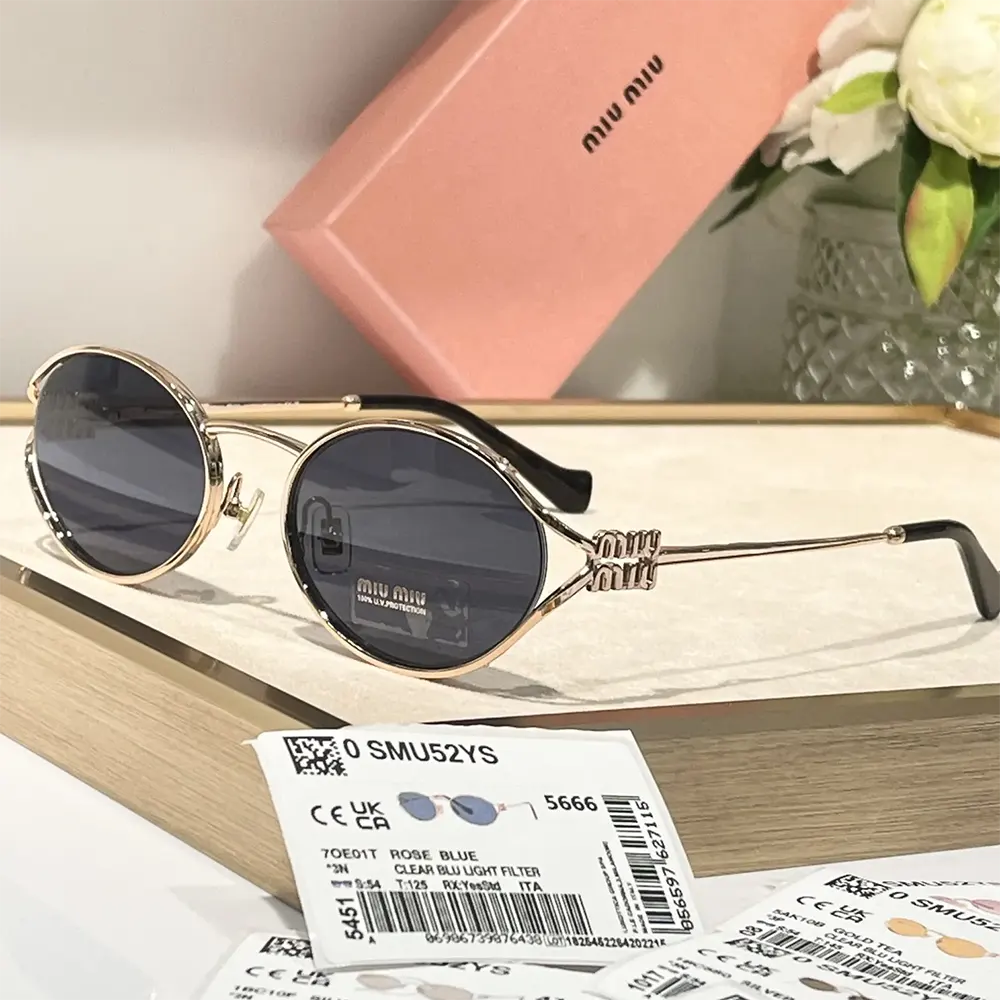 Side profile showing oversized square silhouette of Miu Miu Women Logo Sunglasses