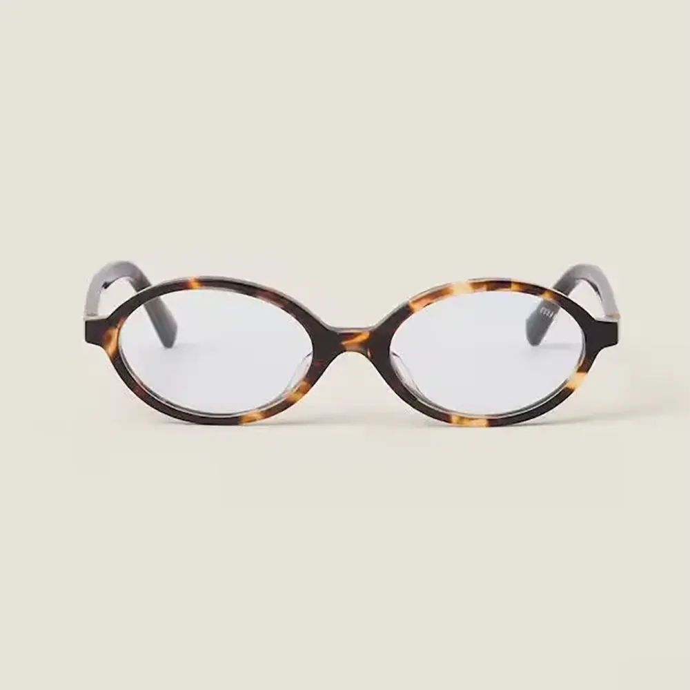 Front view of Miu Miu Women Regard Sunglasses in brown acetate