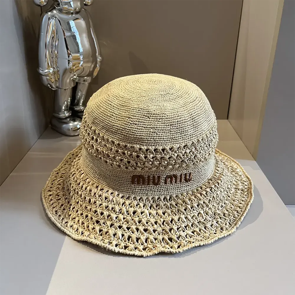 Side angle highlighting the subtle Miu Miu logo on woven hat
