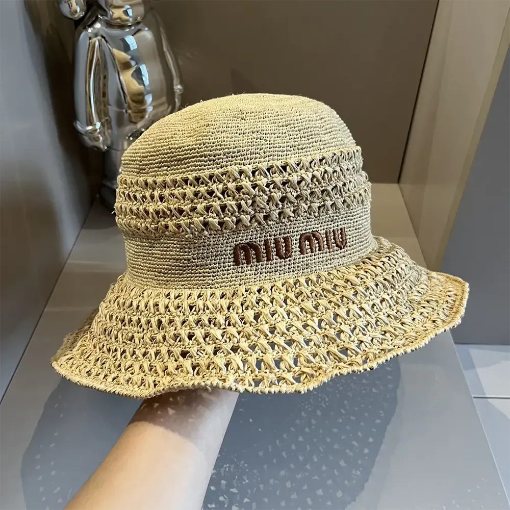 Close-up of woven fabric and soft beige colour on Miu Miu hat