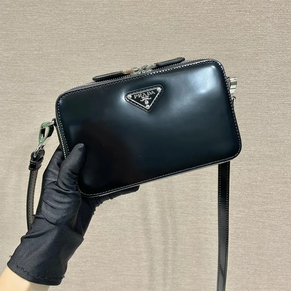 Close-up of brushed leather texture on Prada Men Brique Bag