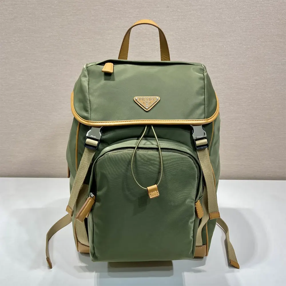 Close-up of leather trim and gunmetal hardware on Prada backpack