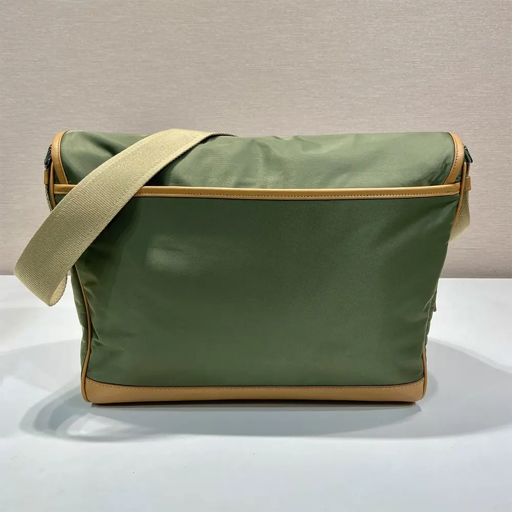 Side angle showing adjustable strap and compact silhouette of Prada bag