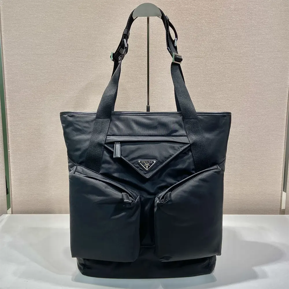 Side angle showing silhouette of Prada Men Re-Nylon and Leather Tote Bag-Black