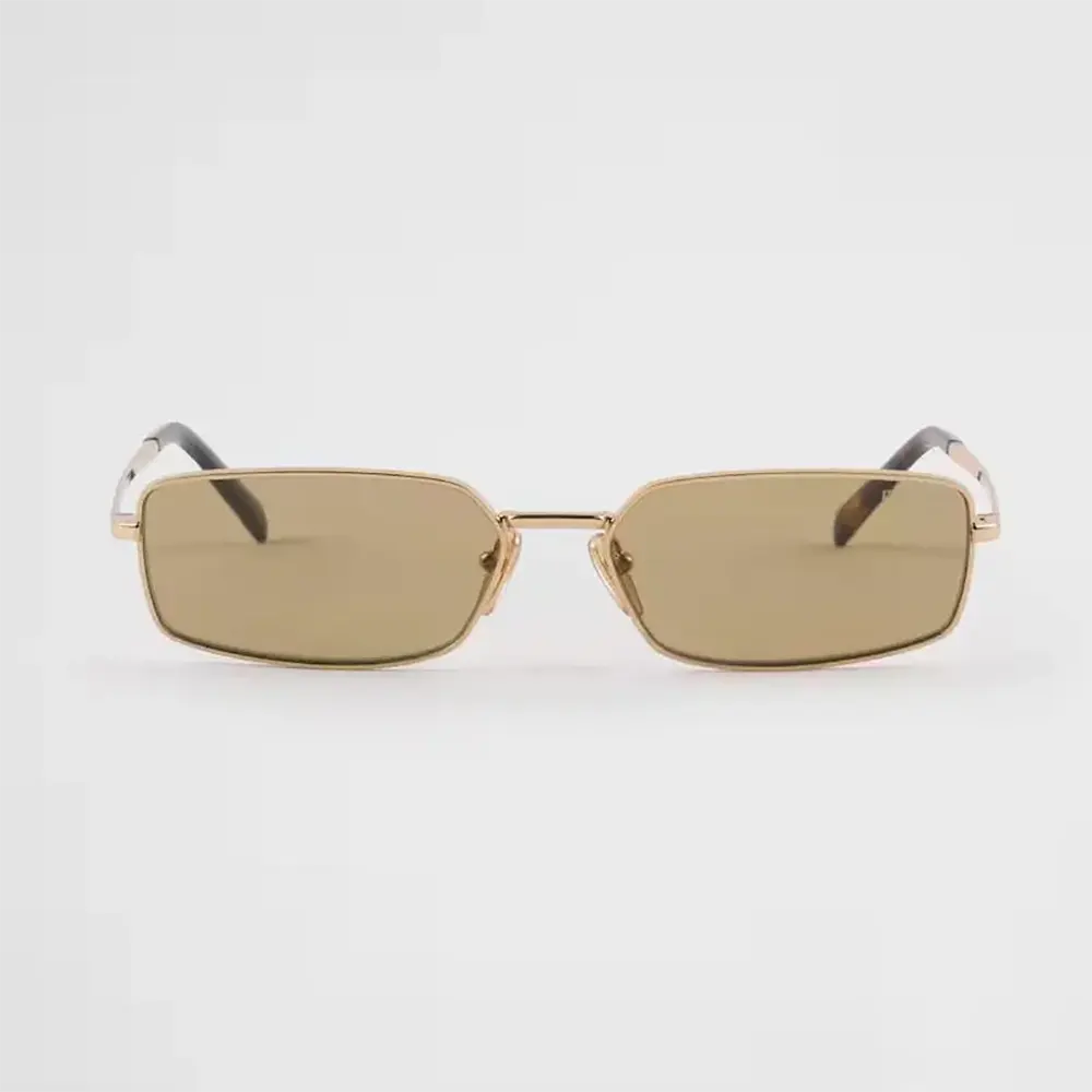 Close-up of Prada logo metal detail on sunglasses temple