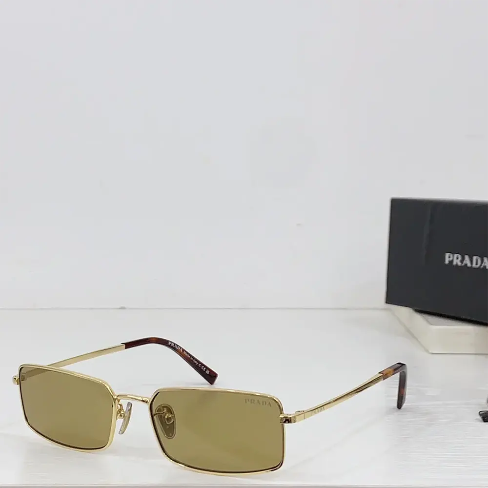 Side angle showing sleek silhouette of Prada Unisex Sunglasses