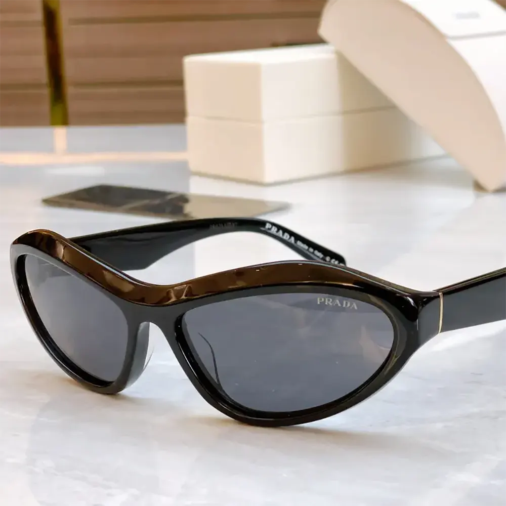 Side view highlighting swing hinge and silhouette of Prada Unisex Swing Sunglasses