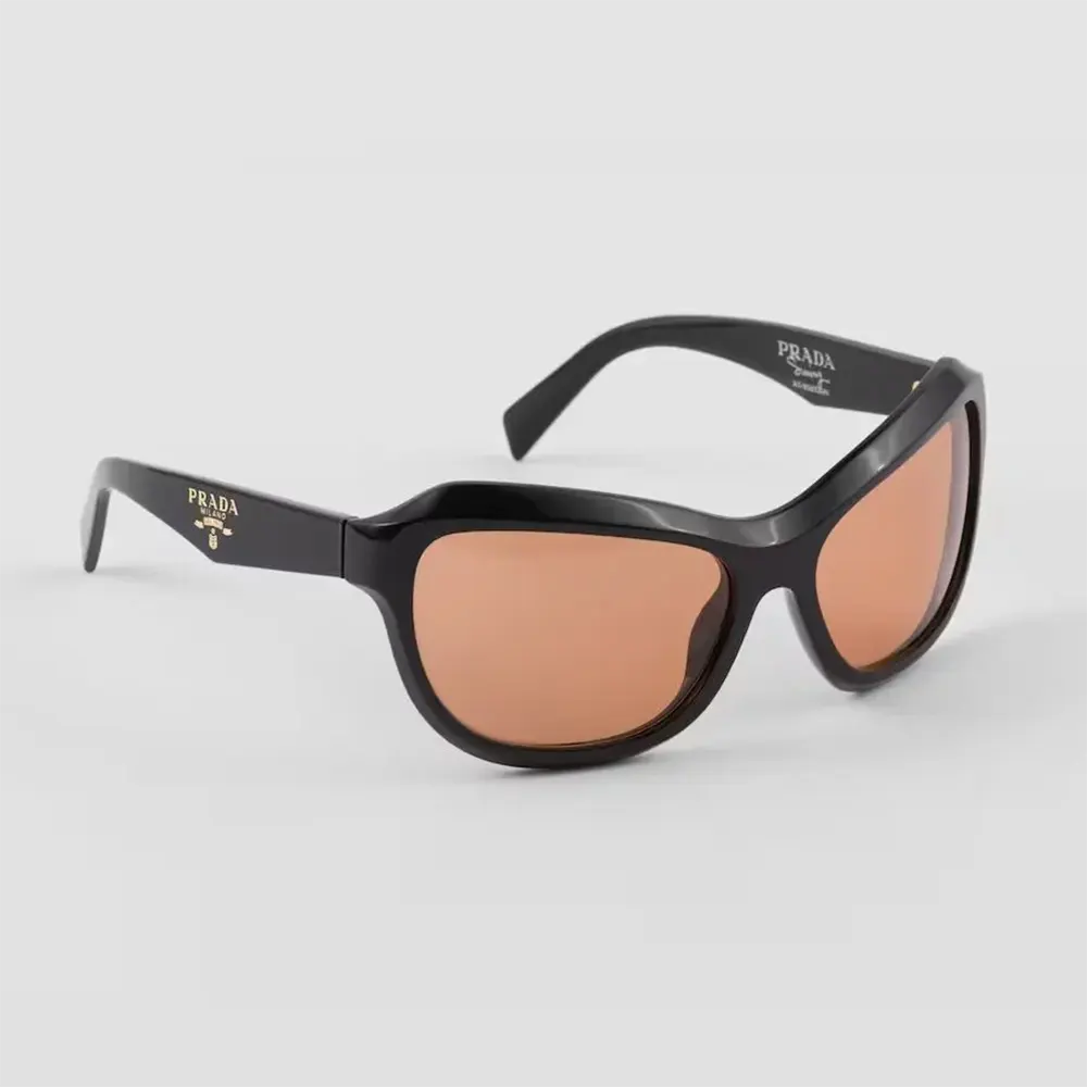 Front view of Prada Unisex Swing Sunglasses in black acetate