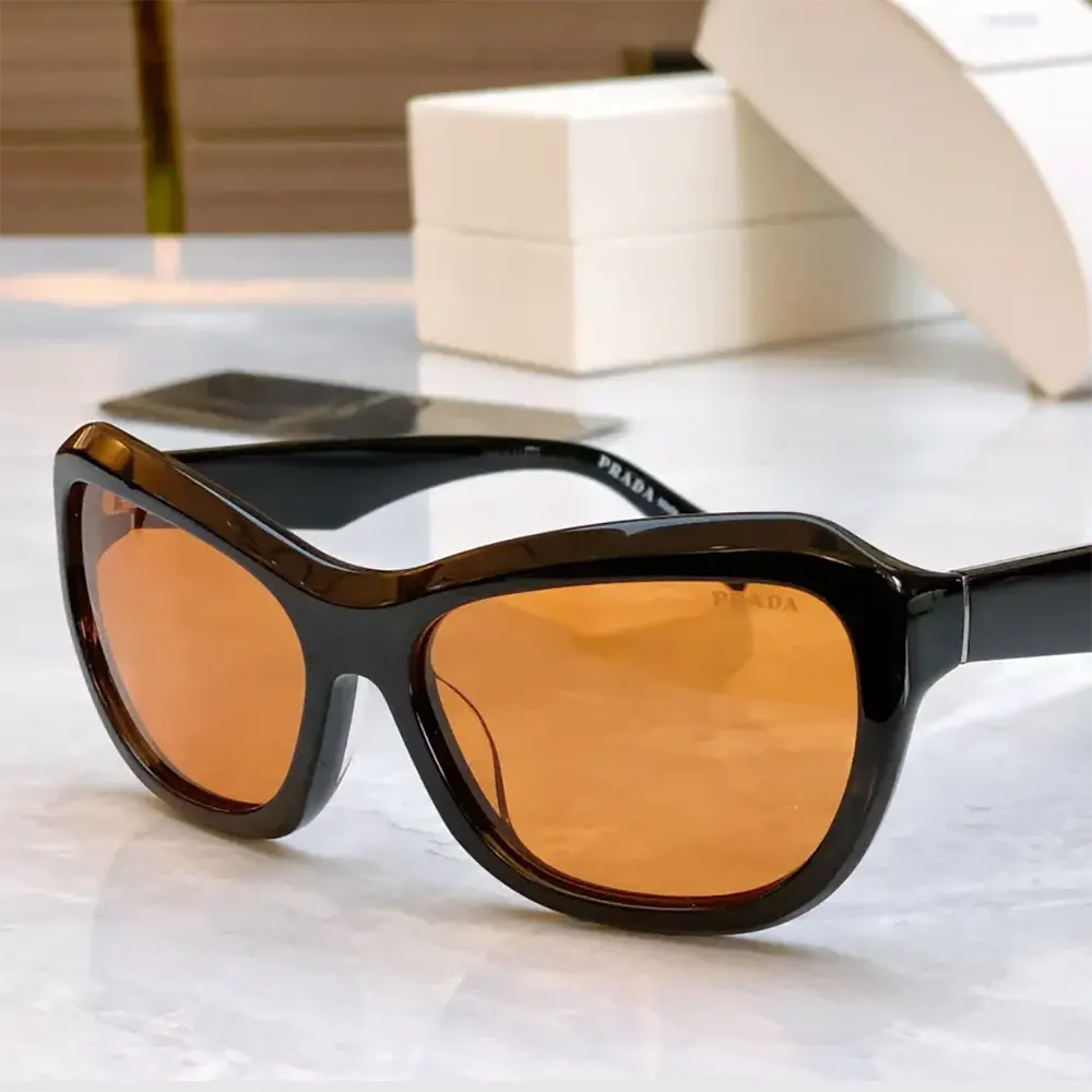 Side angle showcasing lightweight frame of Prada Unisex Swing Sunglasses