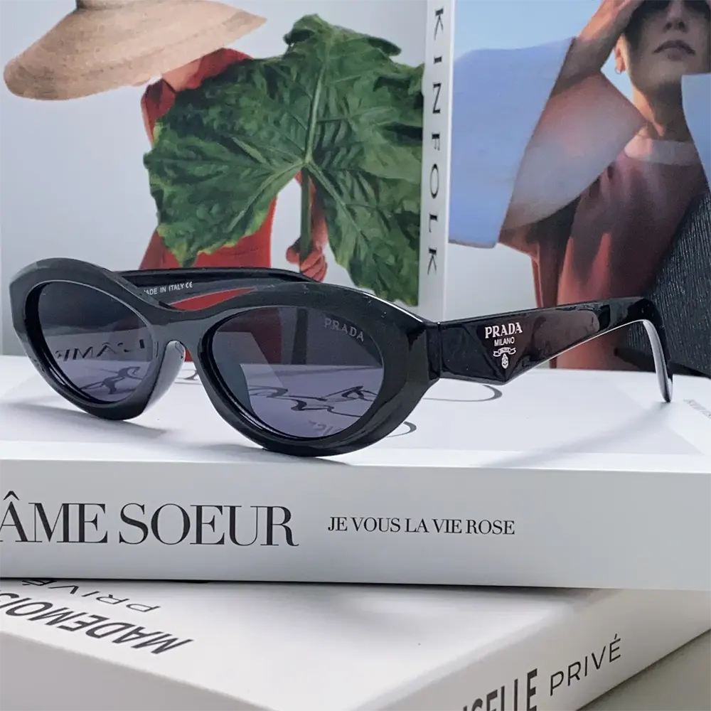 Side angle of Prada Unisex Symbole Sunglasses-Black highlighting silhouette