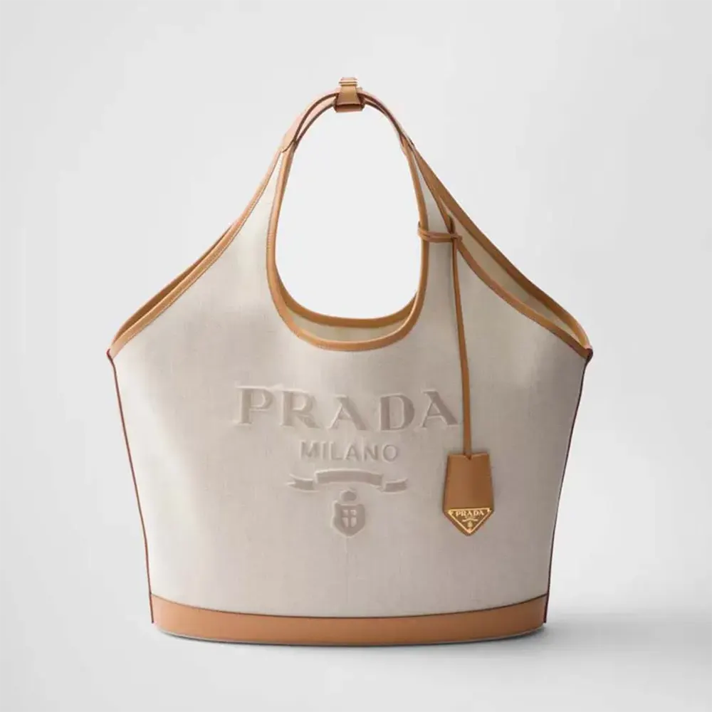 Front view of Prada Women Large Linen Blend and Leather Tote Bag in beige