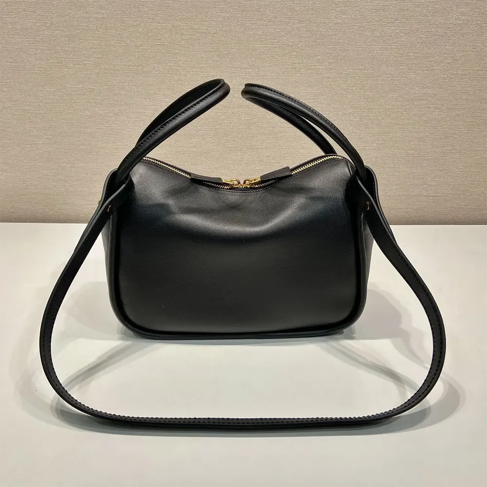 Side profile showing adjustable strap and magnetic closure detail
