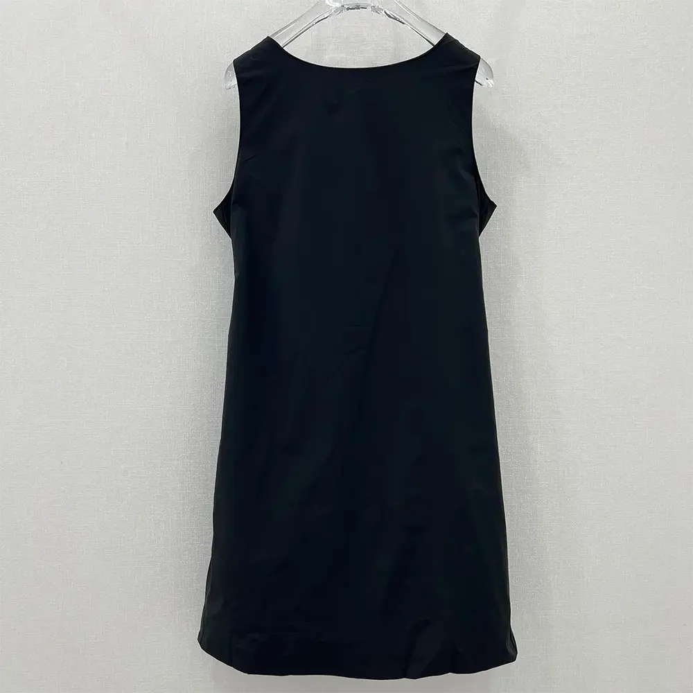 Side angle showcasing silhouette of Prada Women Light Re-Nylon Sleeveless Dress