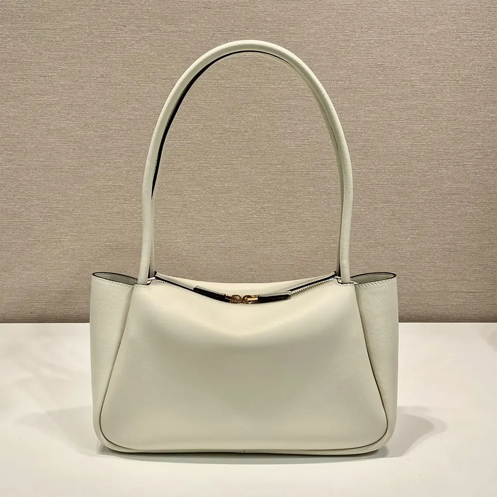 Side angle showing smooth leather texture on Prada Women Medium Leather Handbag-White