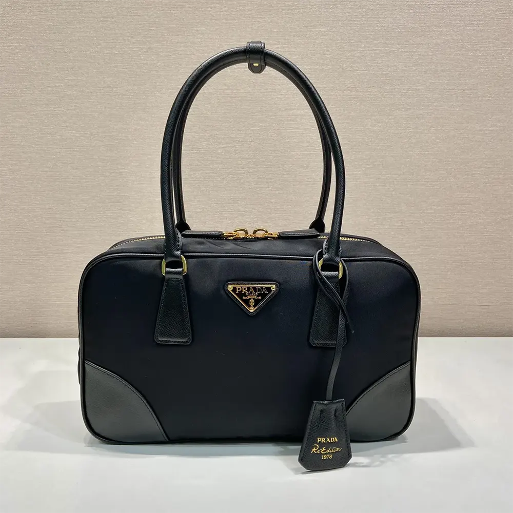 Close-up of Saffiano leather and silver hardware on Prada Women Re-Edition 1978 bag