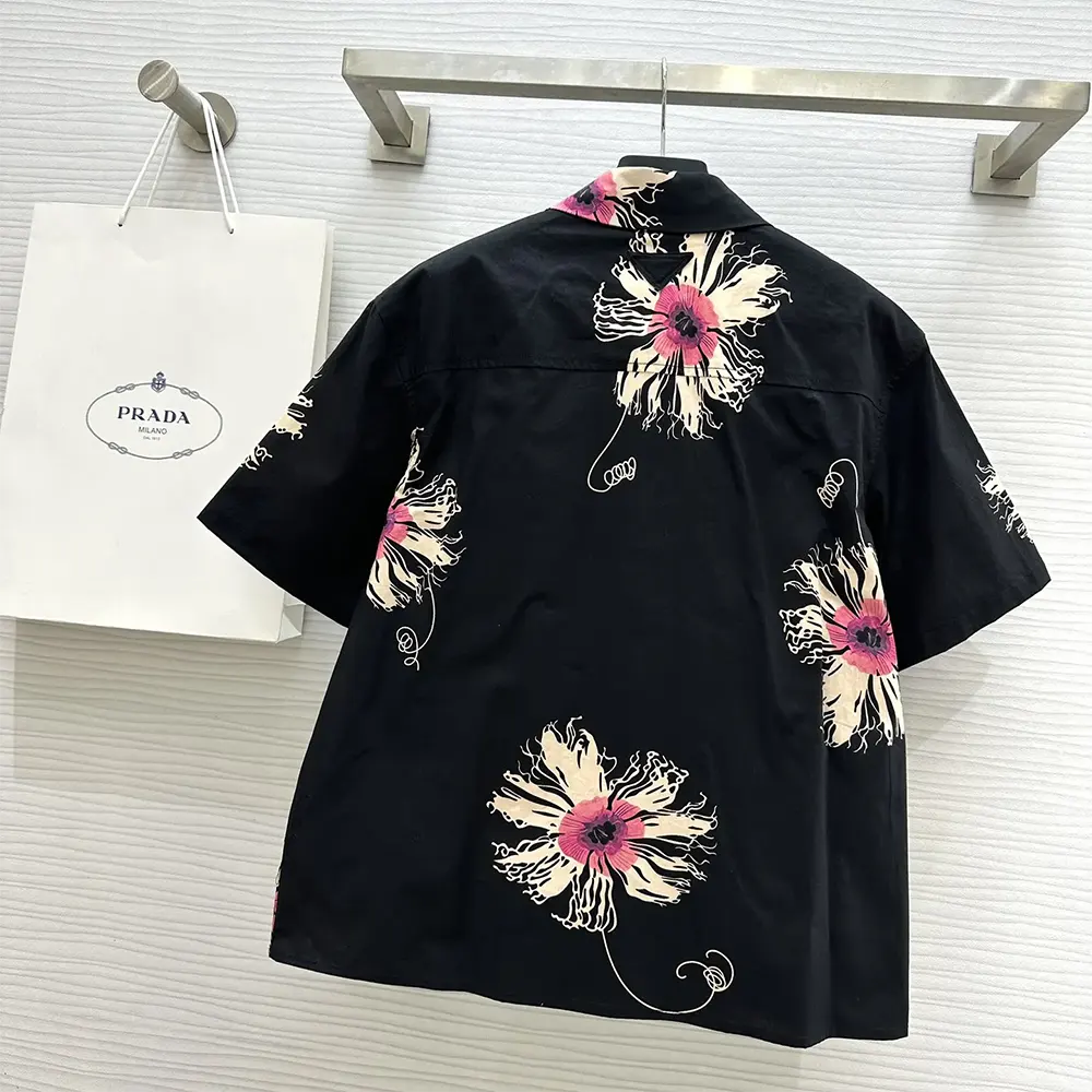 Side angle showing silhouette of Prada Women Short-sleeved Printed Poplin Shirt