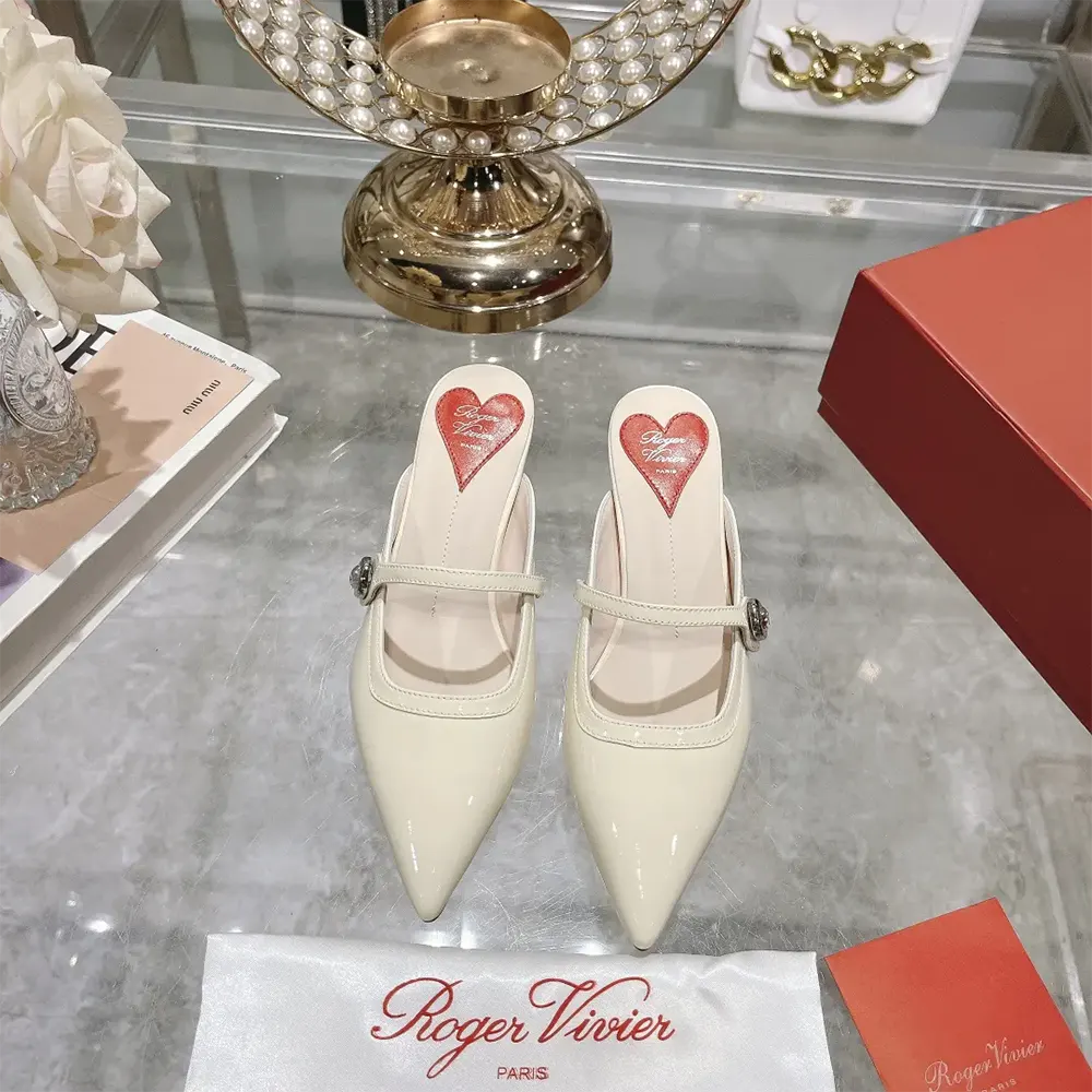 Close-up of Virgule buckle detail on Roger Vivier Women Mary Jane Virgule Mules