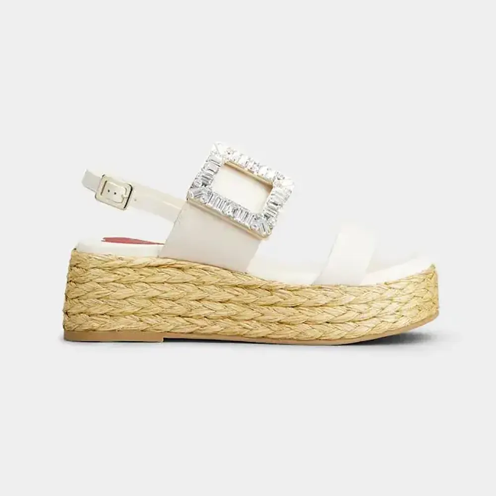 Side view of Roger Vivier Women Strass Buckle Raffia Wedge Sandals in Leather