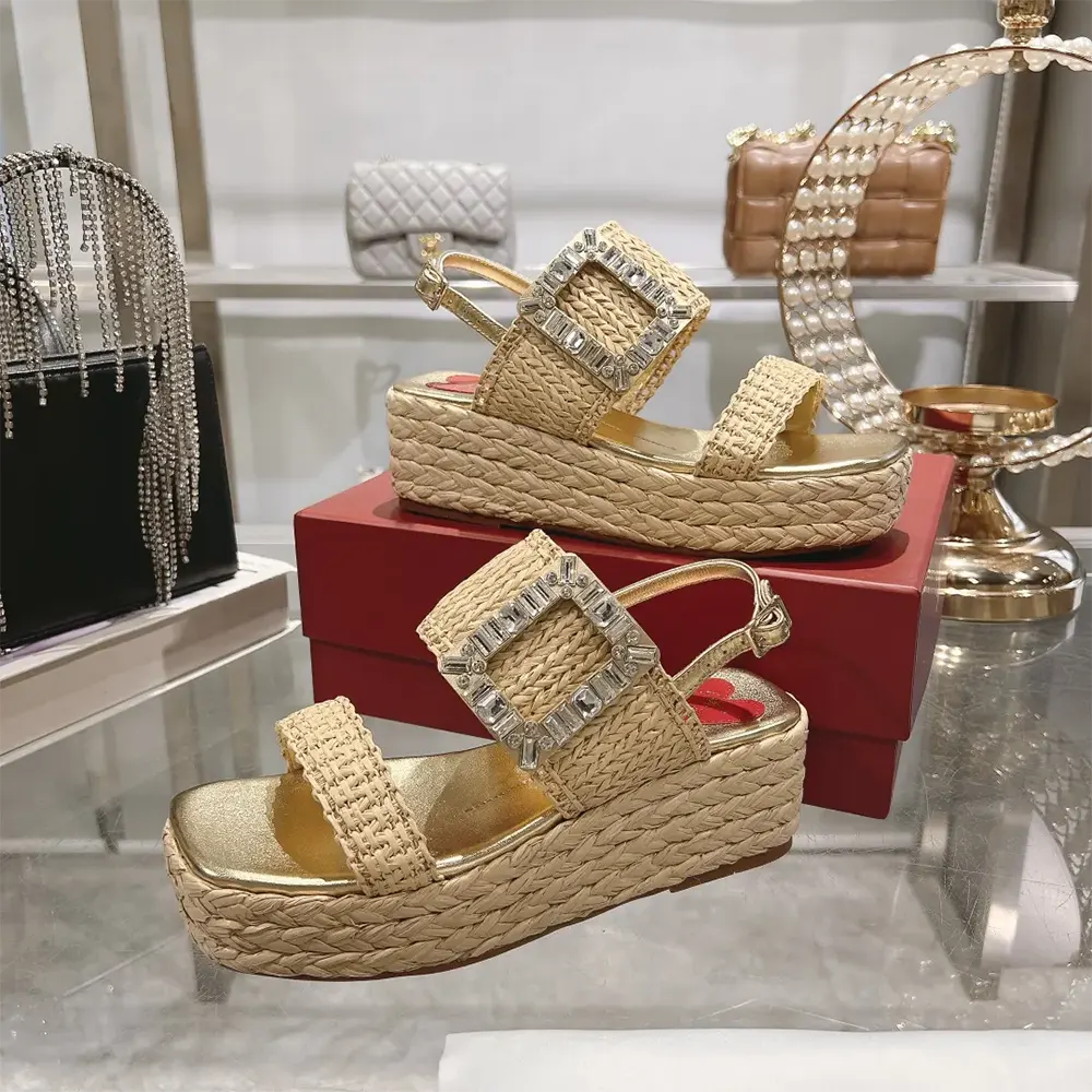 Top view showing natural raffia texture on Roger Vivier wedge sandals