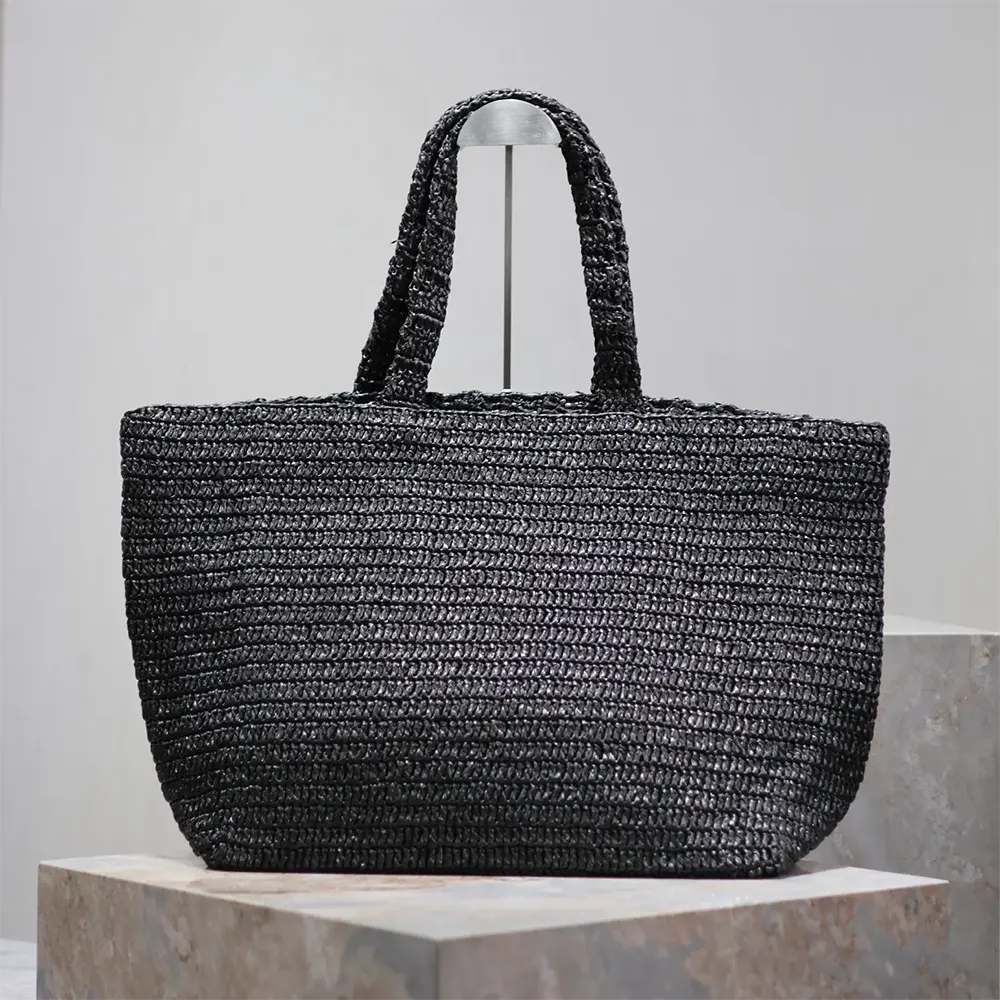 Side angle showing spacious interior of Saint Laurent YSL Unisex Raffia Tote