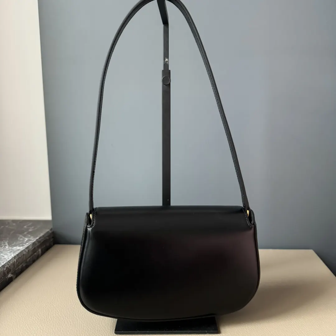 Side angle showing adjustable strap of Saint Laurent YSL Women Mini Voltaire