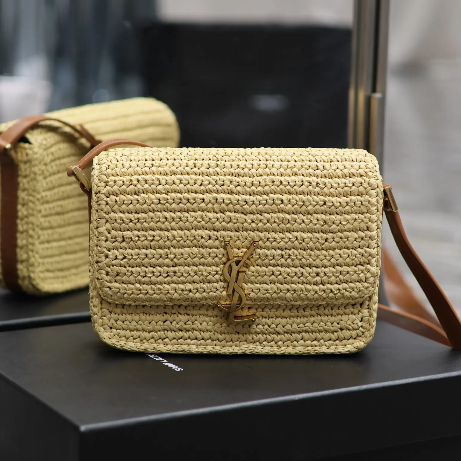 Close-up of gold-tone YSL closure on Solferino Medium bag