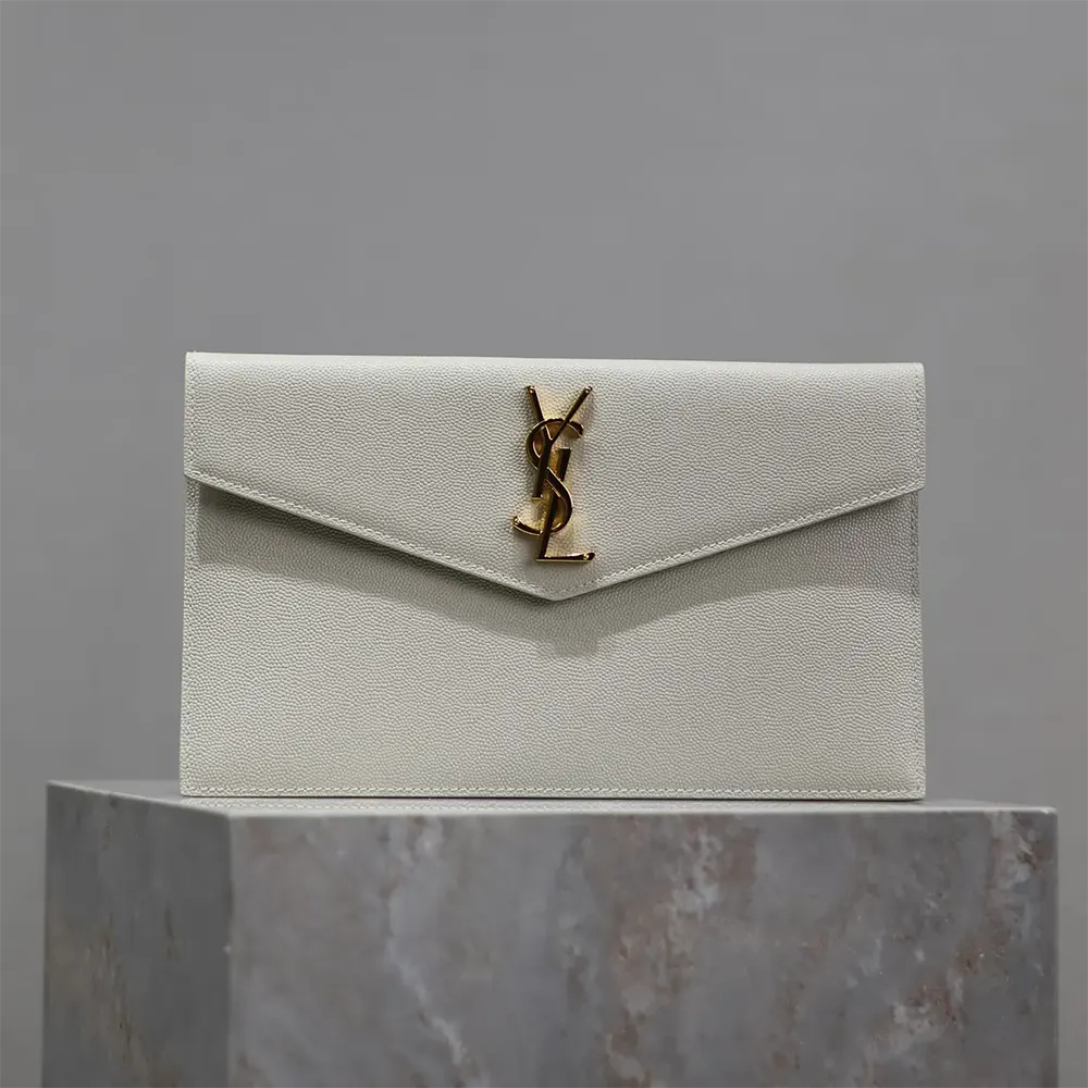 Close-up of grain de poudre texture and YSL gold hardware detail