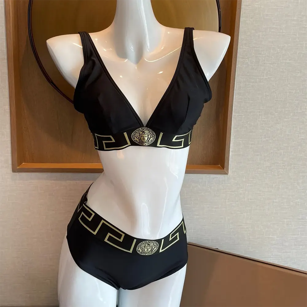 Close-up of Greca border detail on Versace bikini bottoms