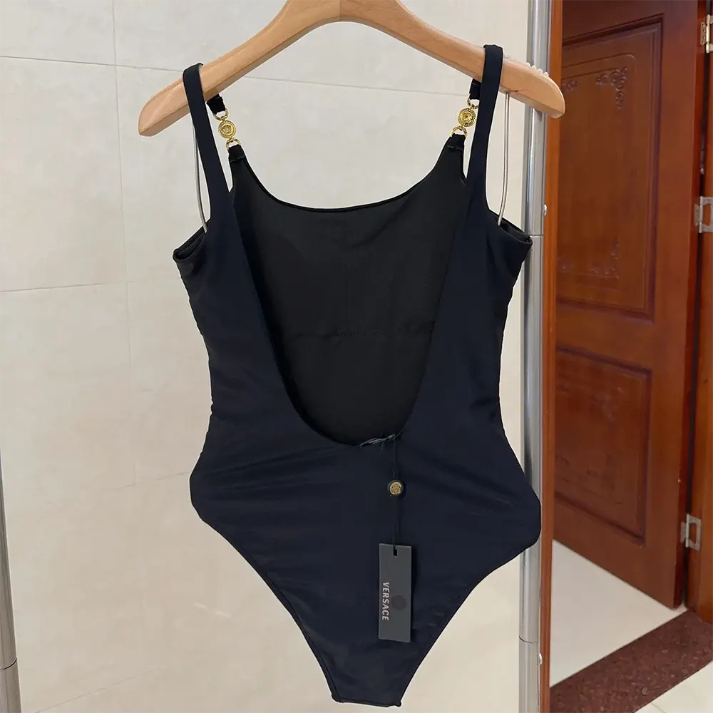 Side angle of Versace Women Medusa 95 One-piece Swimsuit-Black fabric
