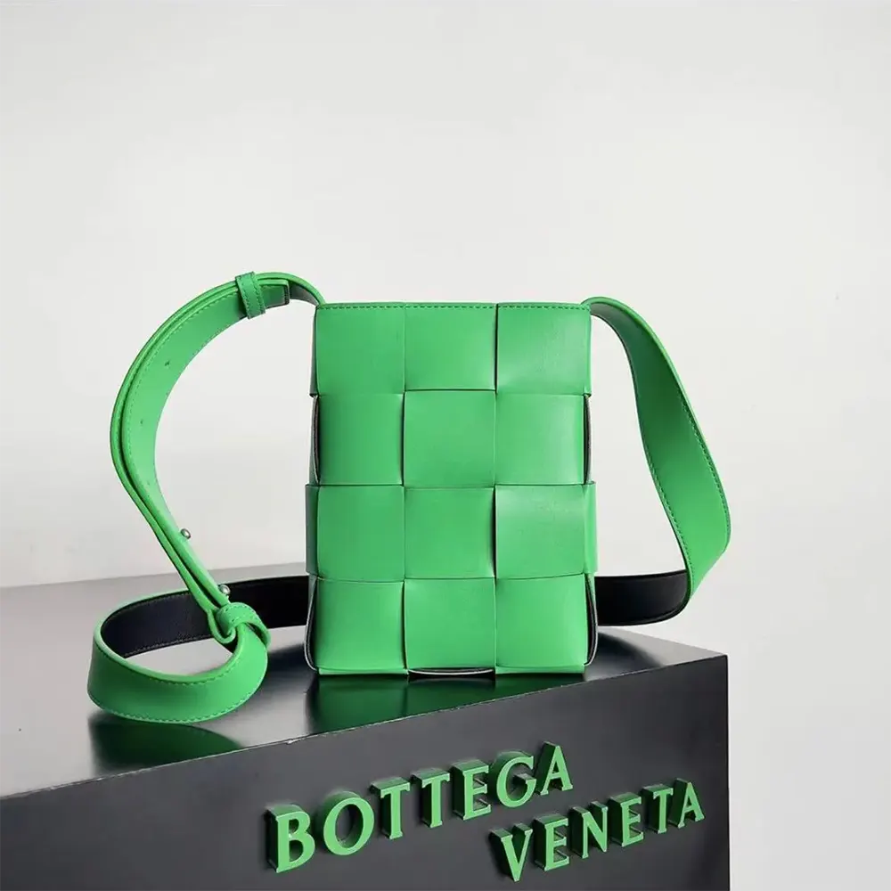 Close-up of intrecciato woven leather detail on mini cassette bag