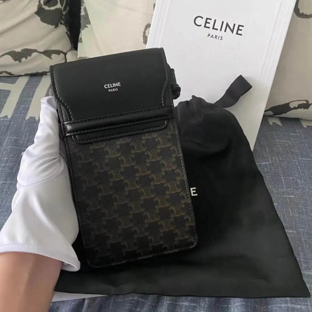 Side profile showing compact silhouette of Celine Women Phone Pouch with Flap