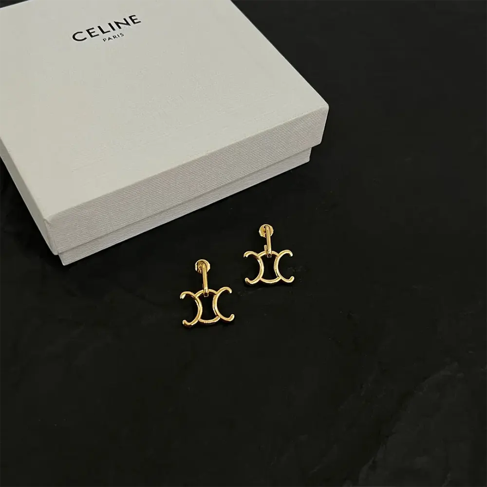 Close-up detail of Celine Women Triomphe Lock Earrings lock design