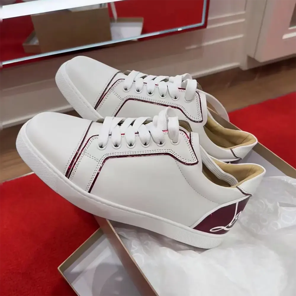 Close-up of red lacquered sole on Christian Louboutin Fun Vieira Sneakers