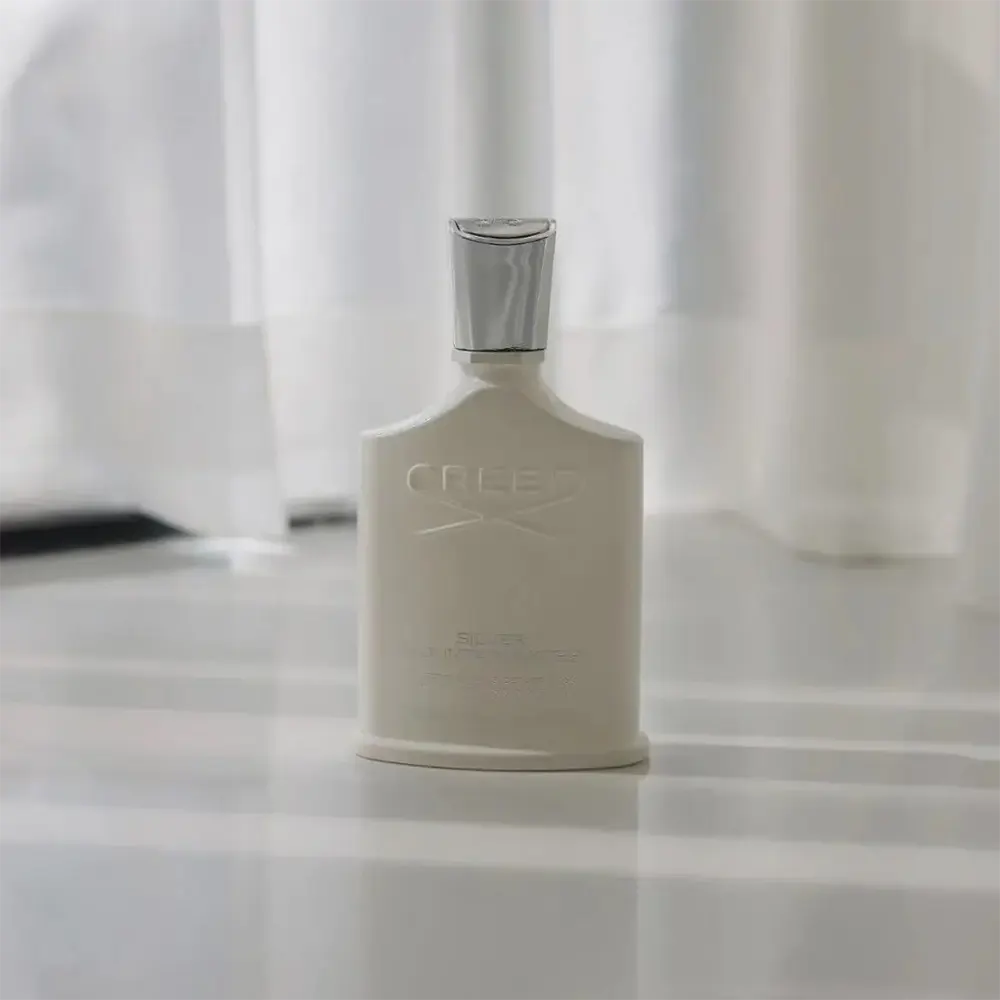 Close-up of silver cap detail on Creed Fragrance Men Silver Mountain Water