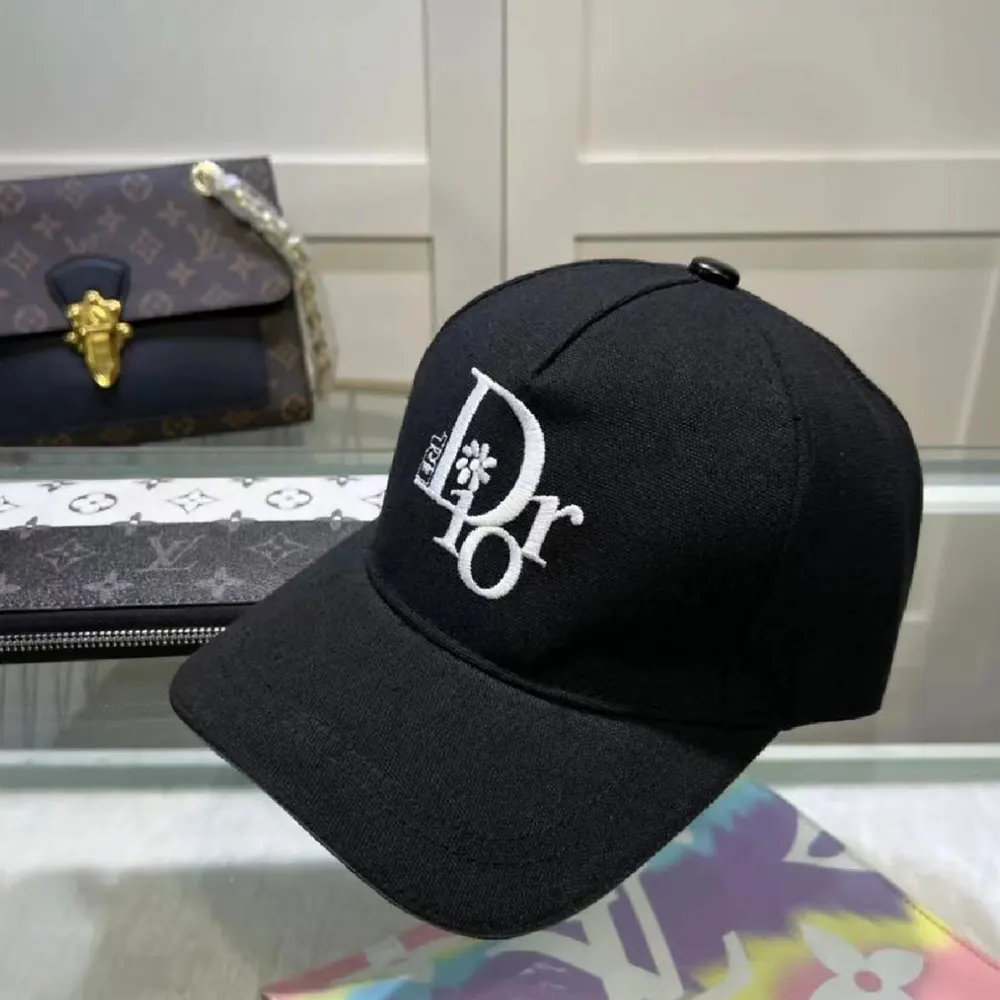 Close-up of Dior logo embroidery on black cotton canvas cap