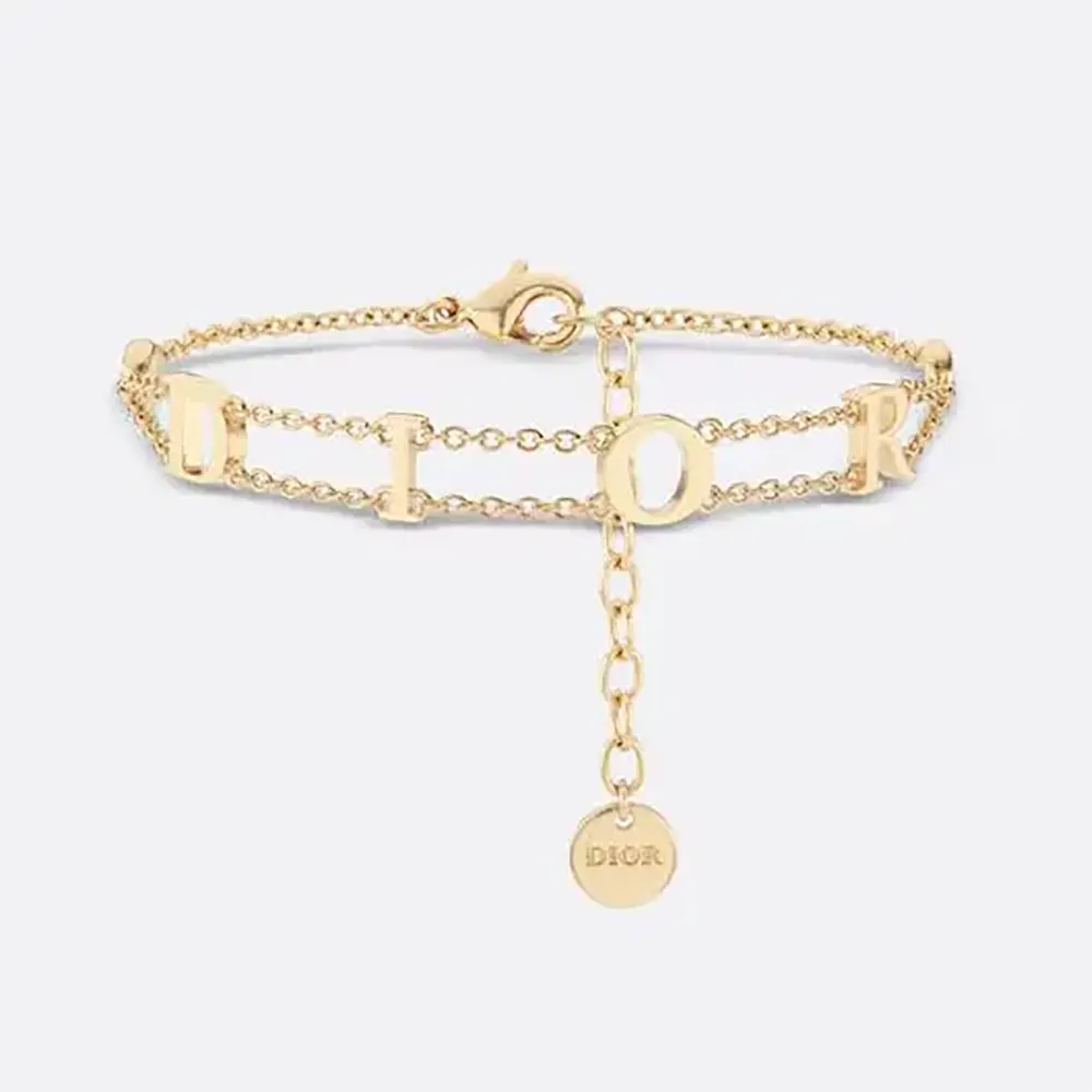 Close-up of Dior Women Dio(r)evolution Bracelet gold finish and crystals