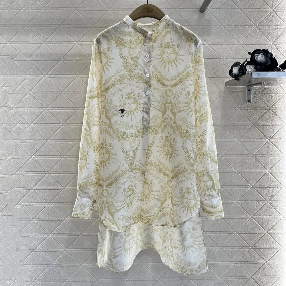 Close-up of Dior riviera button detail on cotton muslin blouse