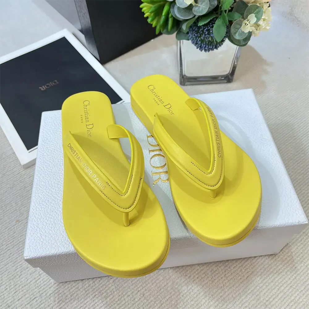 Side profile showing sole and signature embossing on Diorsea sandal