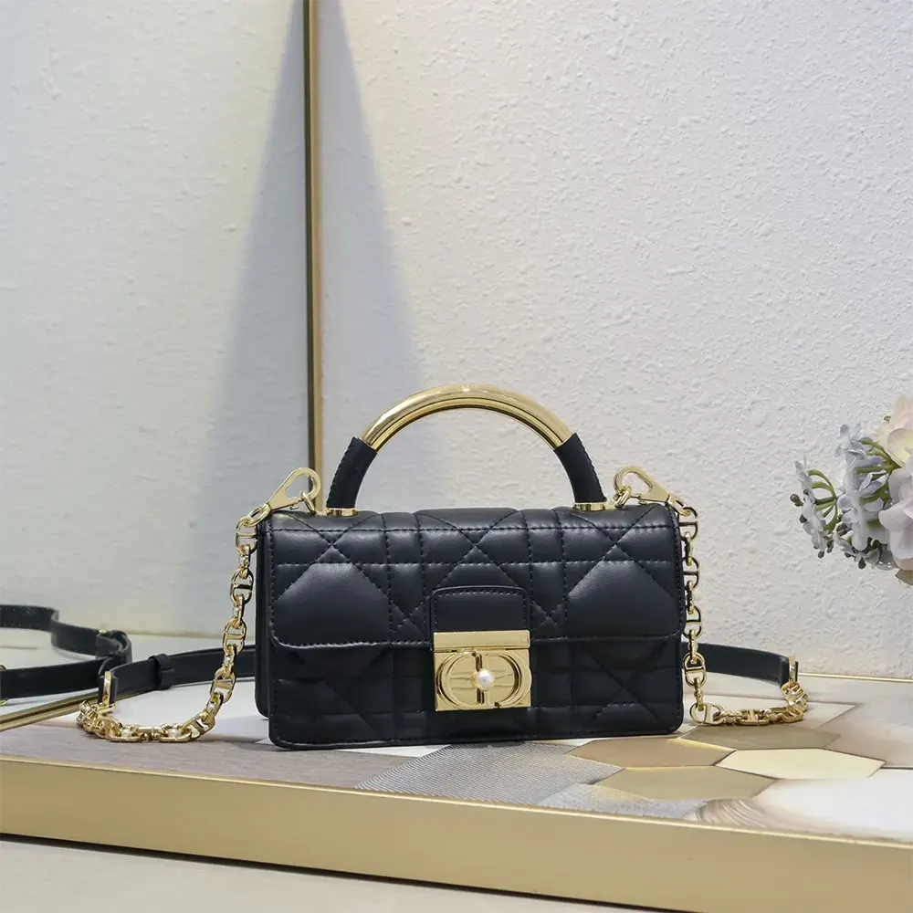 Close-up detail of gold hardware and Macrocannage stitching on Dior Women Mini Dior Ange Bag