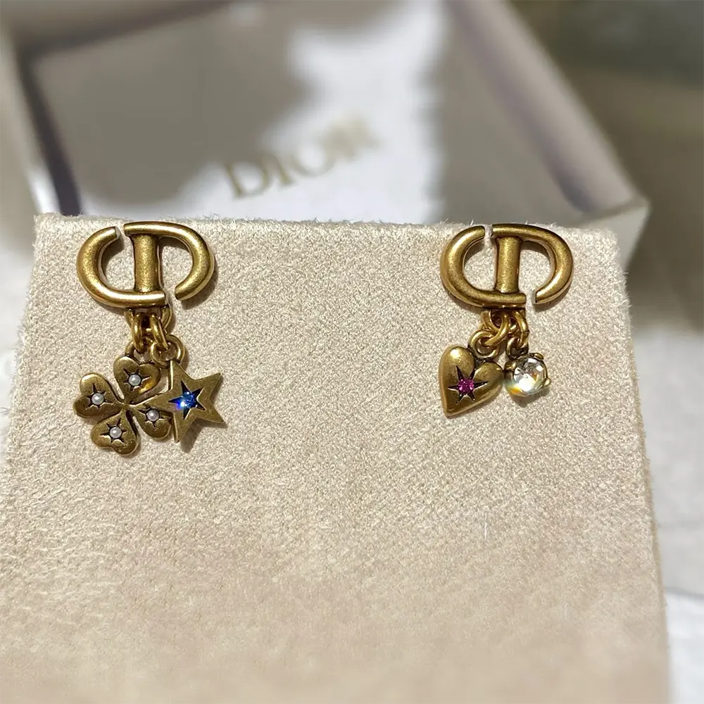 Close-up of clip closure detail on Dior Women Tribales Earrings