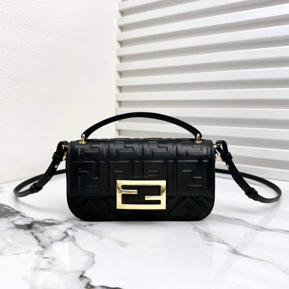 Close-up of gold-tone hardware on Fendi Women Baguette Phone Pouch Black